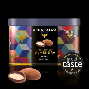 A colourful tin box of Dairy-Free, dark chocolate coated almonds by Arna Falco Valencia, featuring a "Great Taste 2023" award label and decorated with a geometric and butterfly pattern.